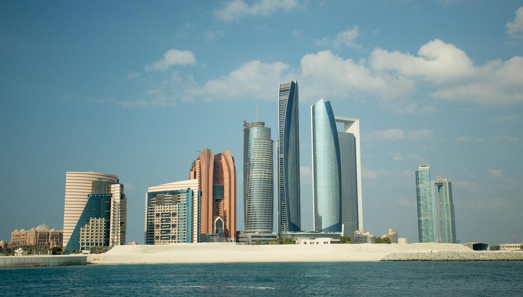 ABU DHABI CENTRE Abu Dhabi is the capital of the Emirate of Abu Dhabi and also of the United Arabic Emirates. It is a T-shaped island jutting into the Persian Gulf.