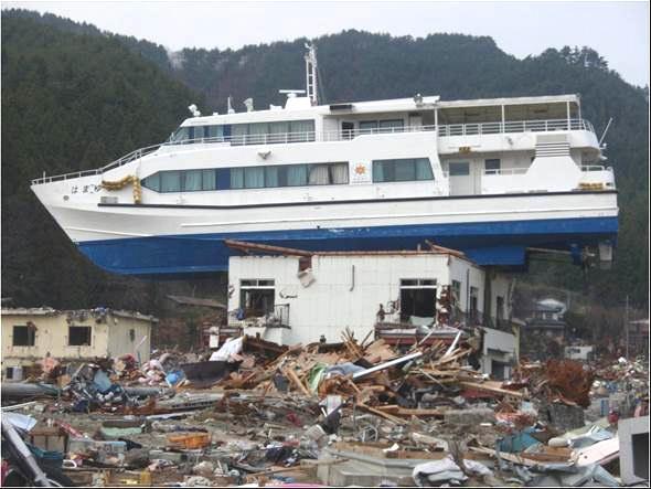 human damage and physical damage per inundated area respectively. The density of human and physical damages in Otsuchi town and are the severest. The third concentrated damage was seen in.
