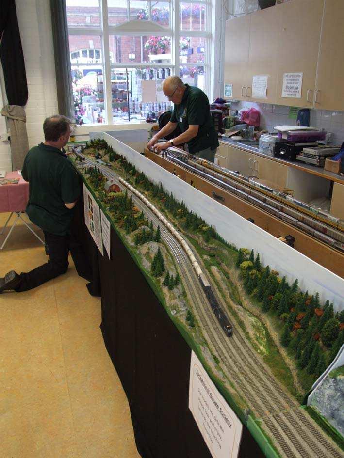 GUY S CUTTINGS Yorkshire Area Group NGS LAYOUT THEME : Continuous run with 4-track mainline through wooded scenery SCALE : N scale (1:148/150/160) SIZE : CONCEPT : APPEARANCES: CONTROL : 17 x 4 (5.