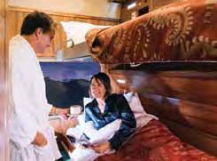 Dining Experience Gold Service guests dine in the classically styled Queen Adelaide Restaurant car.