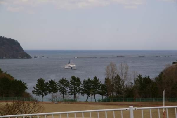 Photo 1: View of collapsed Kamaishi Port