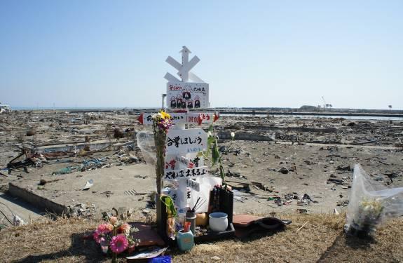 This place is a temporary evacuation place for Tsunami but this hill was also attacked by the tsunami. Figure 25 is the memorial thing for the tsunami this time.