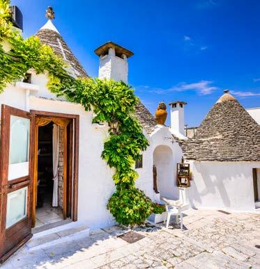 BELLA PUGLIA BY RAIL Journey past whitewashed cathedrals, secluded coastal coves and olive-studded groves as you travel through Puglia, the jewel of Italy s Adriatic coast.