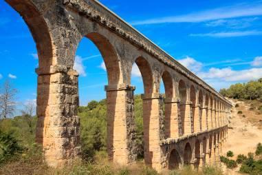 & Tarragona & Sitges Full-Day Tour Roman Aqueduct Roman Amphitheater Sitges Beach Head south to the ancient city of Tarragona and