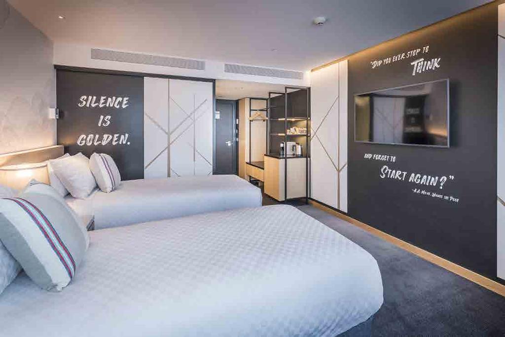 ACCOMMODATION All rooms feature Wall-to-wall window with Auckland harbour
