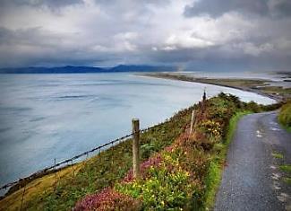 Day 4. Wednesday 18 th September Today it s time to venture out around the Ring of Kerry. The Ring of Kerry What is the Ring of Kerry? Well, it s a route. A trail. A road.