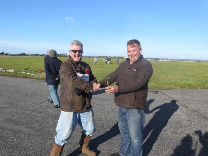 Poppy Glider Competition 2015 The competition was run on Remembrance Day starting at 1230 at Thorny Island, once again we were blessed with good weather and the wind was from the NNW.