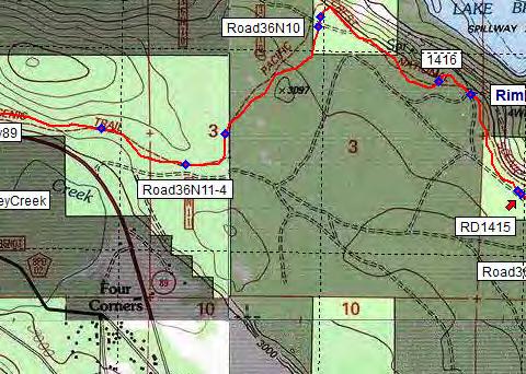 PCT joins the unpaved road for about 75 yards. - mi 1415.1-2994 ft d36n11-3 - Unpaved d 36N11, third crossing.