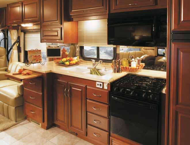 SOLID SURFACE COVERS fit neatly over the galley sink and range to provide more countertop space instantly.
