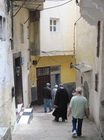 From the Casbah, Nageb lead us down into the Medina, the old city. The Medina had high stone walls and narrow lanes. We didn't go far. He showed us around a "blind" alley to an open gate.