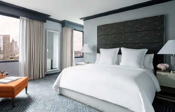 ultra-spacious luxury hotel rooms and suites boast commanding views of the city skyline.
