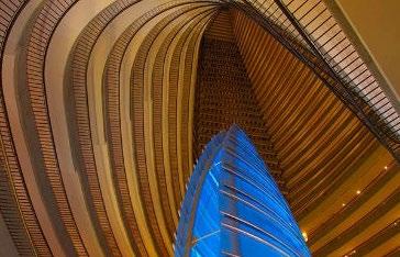 The hotel's amazing atrium is marked by the 50-foot color changing sail of Pulse, a cool cocktail lounge and iconic symbol of this downtown Atlanta hotel.