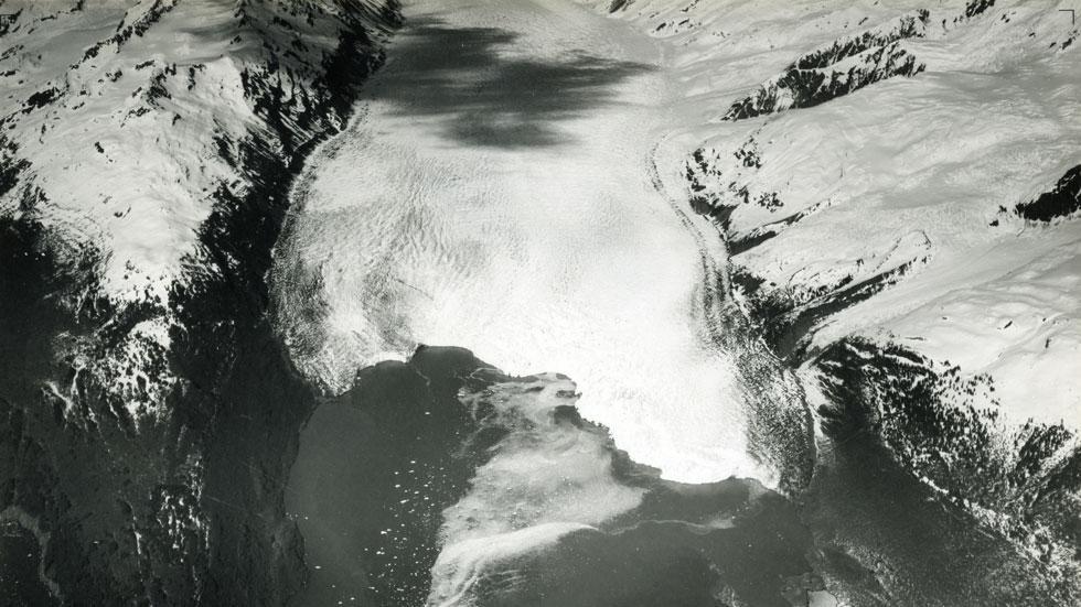 The first photo, taken in June 1937, shows the tidewater terminus of the Yale Glacier in Prince William Sound, Alaska.