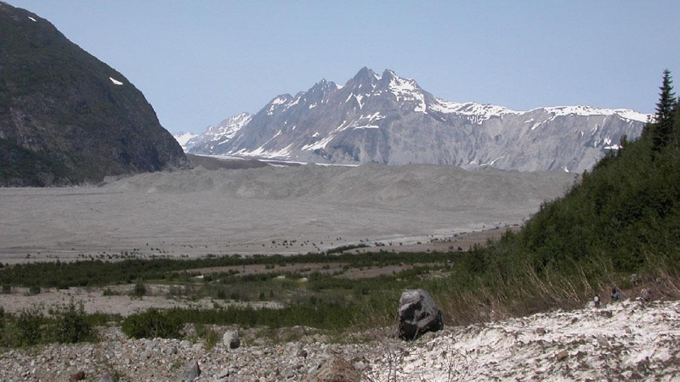 (USGS/Charles Will Wright) The second photo, taken in June 2004, shows that the terminus of Carroll Glacier has changed to a stagnant,