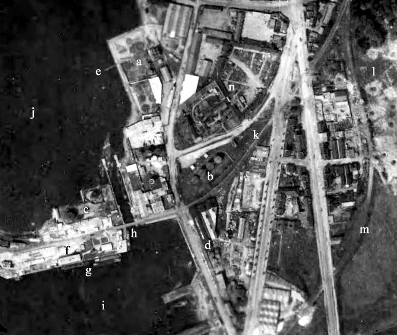 degaussing station (Tomezzoli & Pottier, 2016); g: moored barges; h: movable bridge; i: Bouvet basin; j: Jacques Cartier basin - Mare aux Canards; k: railway; l: