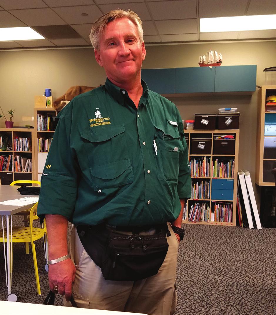 There are many people who work at the museum: Security staff wear tan or green shirts.