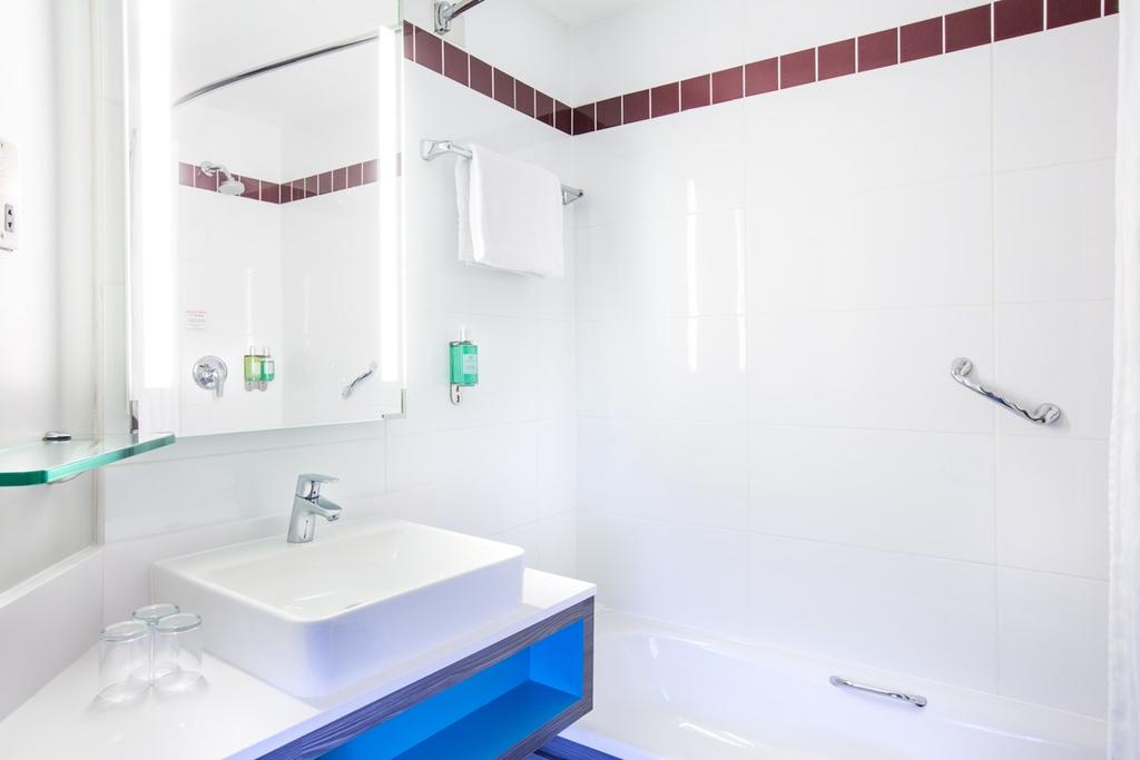 Bathrooms, Shower-rooms and Toilets (Ensuite or Shared) A fully accessible room has no bath in the bathroom but there is a wet room shower, with a seat attached to the wall.