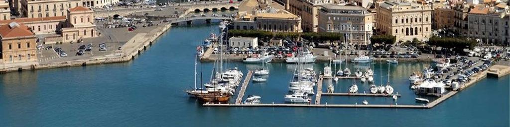 In Siracusa s harbor, Ortygia Island (also called Città Vecchia or Old City) is the site of many of the main attractions, including the seventh-century cathedral and the Fountain of Arethusa.