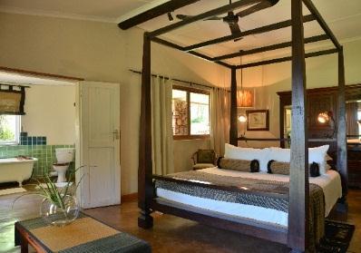 The homestead has an old-world farm house atmosphere and each room has direct access to the surrounding garden.