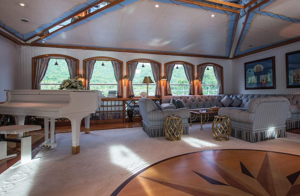 Main Lounge Golden Odyssey II s interior style is nautical and traditional,
