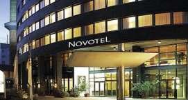 The air-conditioned rooms at Novotel Barcelona City have simple, modern décor and include tea and