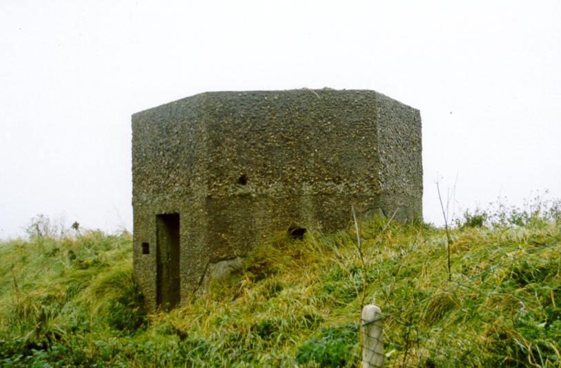 It is rendered with pebble dashing to assist in its camouflage. Fig. 7 - UORN 5172: tall type 22 pillbox, with a solid upper portion to serve as the base for an anti-aircraft gun.
