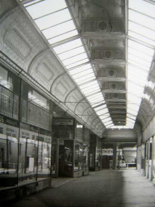 were used in abundance in the structure and large louvre lantern lights divided into bays with panels of stamped metal surmounted the centre of the arcades for their whole lengths.