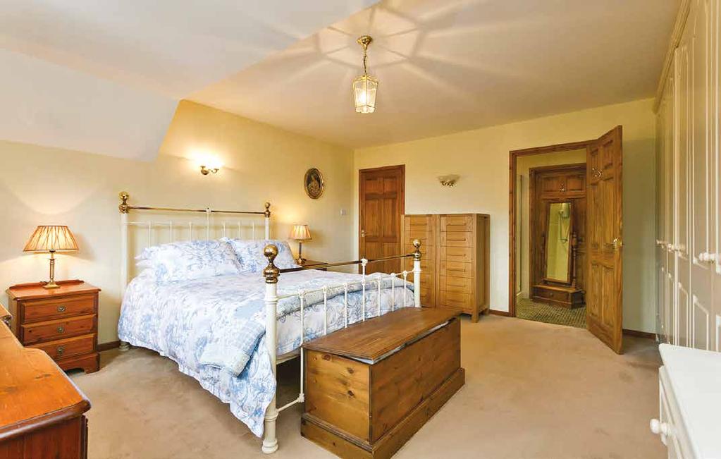 On the first floor are four double bedrooms and a smaller single room.