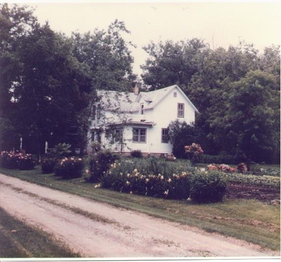 The farm house and its gardens in