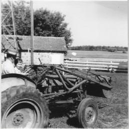 side. The cow barn had stanchions for 20 milk cows. In 1956, when I was a 50/50 partner with Dad in the farming business, I added eight more stanchions for the growing herd.