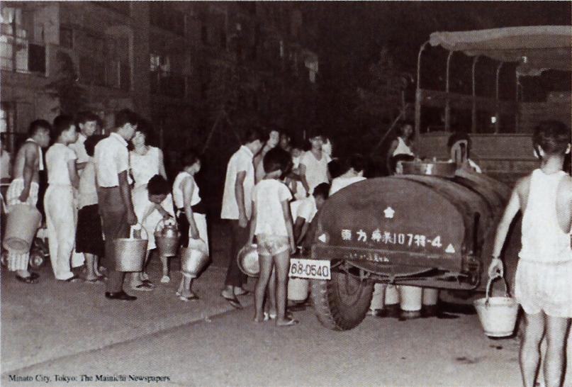 People waiting for water supply In 1964,