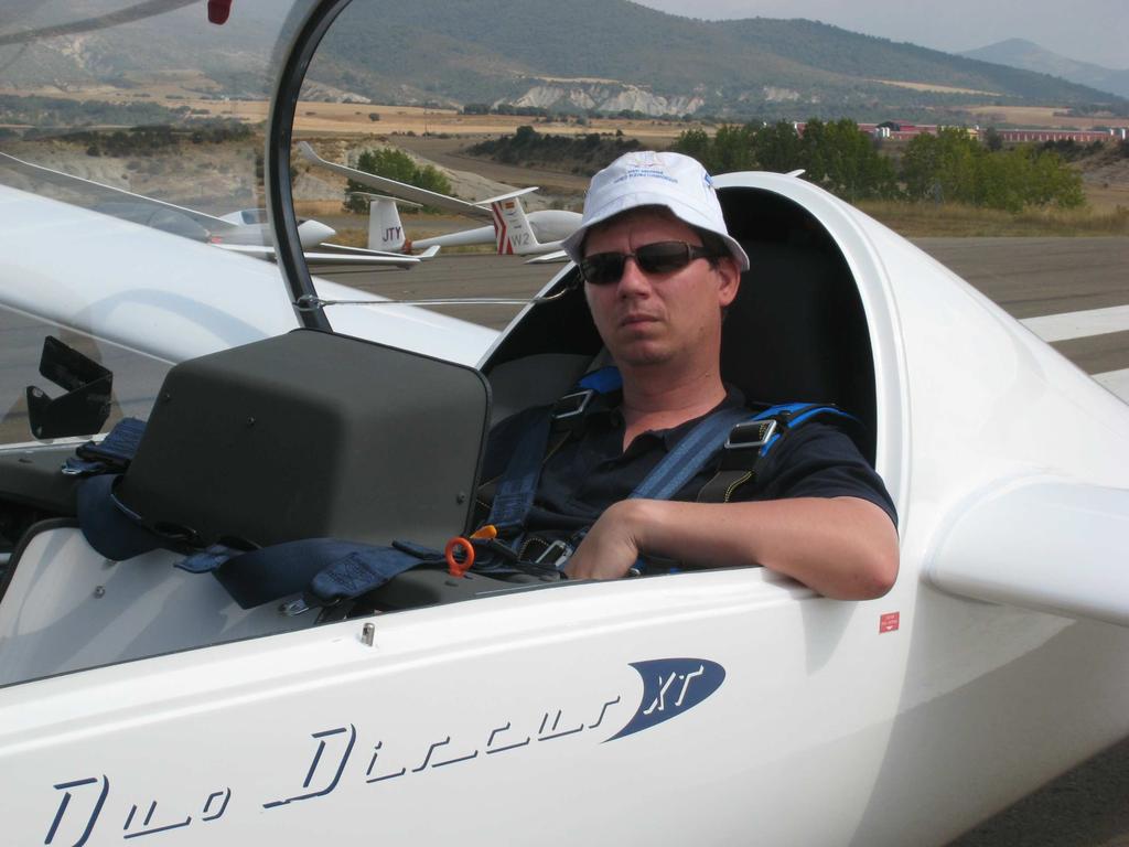 years. He has been an instructor since 1982. He has logged a total of 5100 gliding hours and he has a 1000km Diploma.