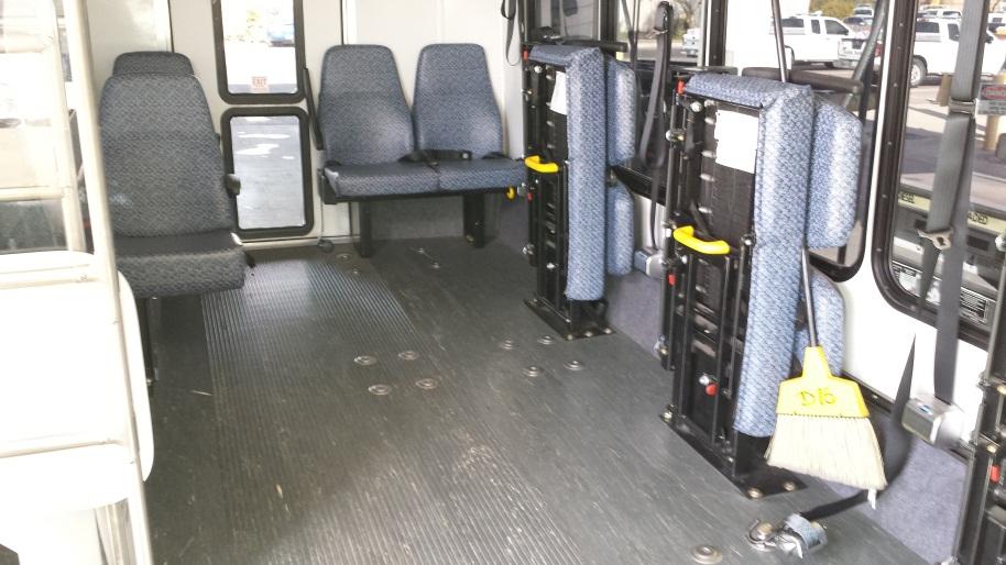 Forward-facing flip seats are used in securement areas to maximize ambulatory seating if securement locations are not in use.