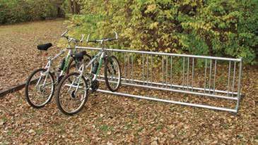 Rack is an M-Style bike rack that uses 12 gauge steel curved back and forth to provide 7 spots for bikes to park.