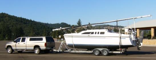 ) 1976 hull, new standing rigging, new sails (150, 100 and Main), new Honda 5 horse, new paint, new cable railing, new rudder, newly re-upholstered vinyl