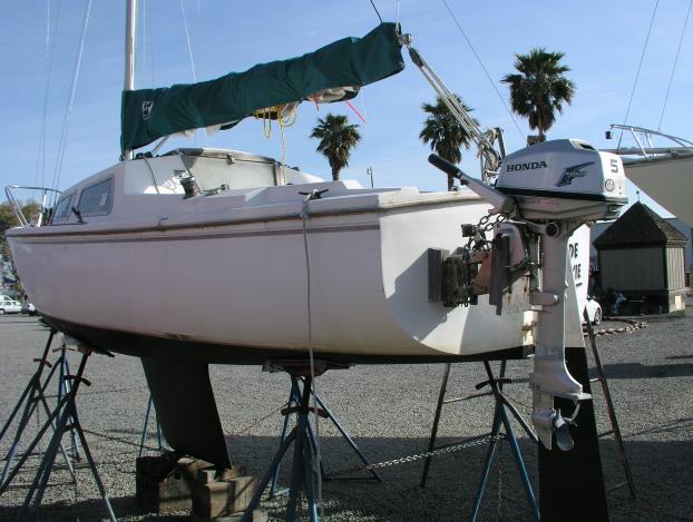 9 hp Honda outboard, water ballast, West Marine VHS, Garmin Depth Finder and GPS chartplotter, Force Aluminum anchors, inflatable dinghy, 6 gal.