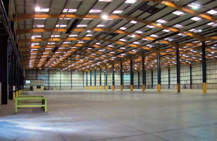 The warehouse is heated via gas fired radiant heaters in the roof and lit by a combination of inset roof lights