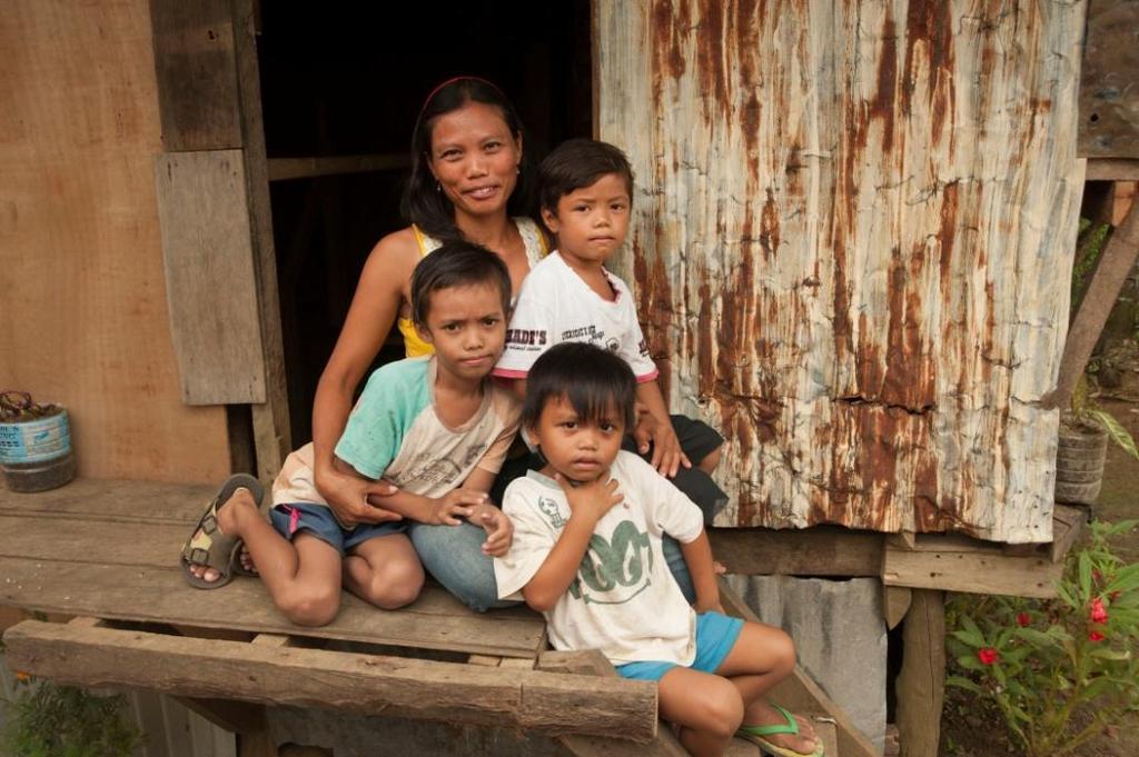 When I see my kids smile, I am happy Mary Jane Lagarel Suco s house was destroyed when Typhoon Haiyan ravaged the Visayas region of the Philippines on 8 November 2013.