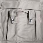 Padded Arashield reinforcements on elbows and knees Roomy Semi bellows pockets on jacket Bellows pocket on left side of pant, Medic pocket on right side Zipper pant cuff expansion Hook and loop cuff
