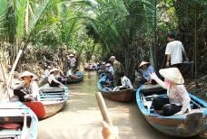 Arrive My Tho and get on a boat trip up Mekong River with a stop at the Thoi Son islet to taste seasonal fruits, enjoy traditional folk songs.