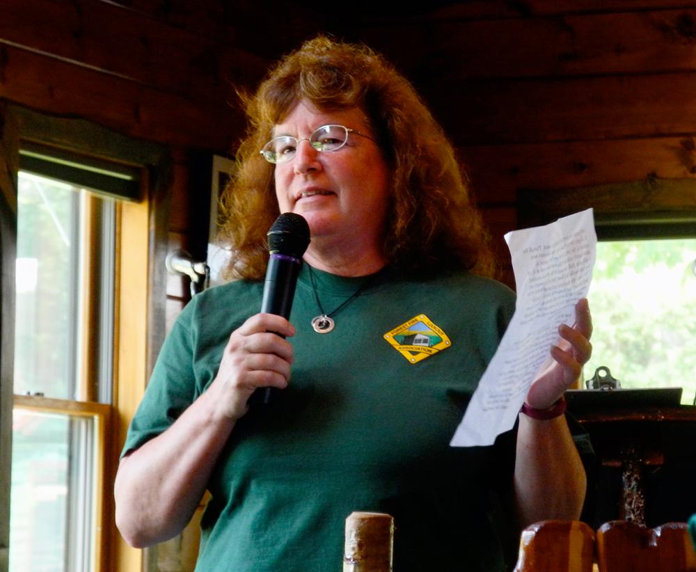 Laurie Rankin, who heads the Forest Fire Lookout Association for New York, speaks at a centennial celebration for the St. Regis Mountain fire tower Sunday at the Lake Clear Lodge and Retreat.