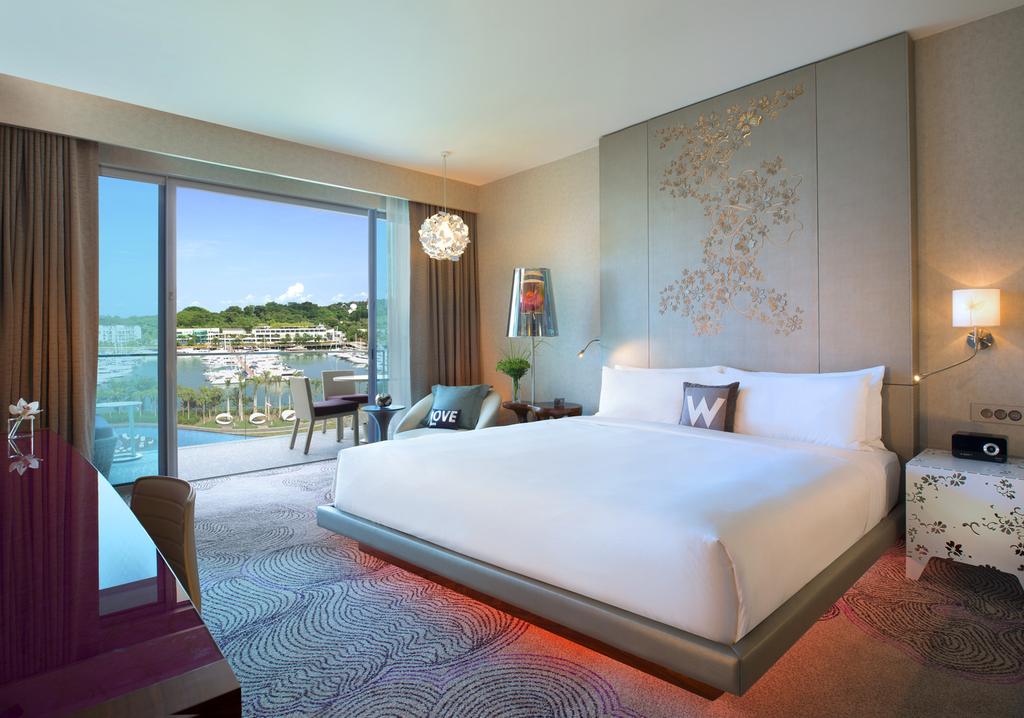 Each Suite / First Class passenger enjoys: Complimentary one night stay in the Deluxe Room at The Fullerton Bay Hotel Singapore* plus a host of benefits -- Return airport-hotel limousine transfers