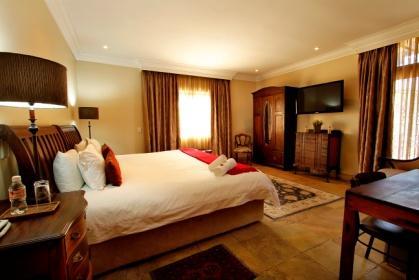 ACCOMMODATION Afrique Boutique Hotel Ruimsig harnesses Four Executive, Four deluxe and Seven Standard Suites