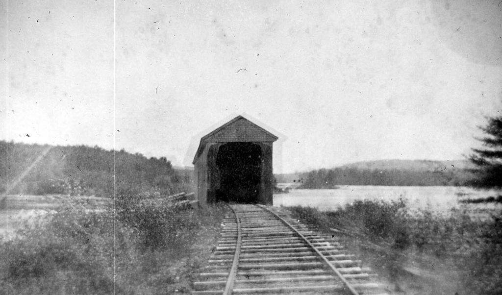 The little four and a half mile section of track in Canada was useful to the railroad. Halfway along this section, a vein of water intersected a ledge high above the tracks.