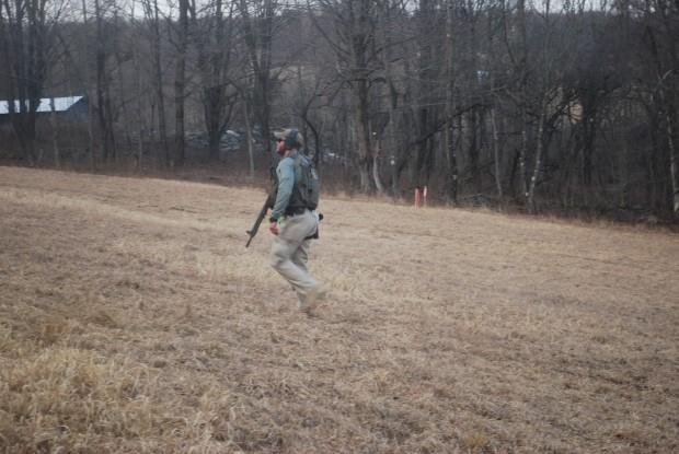 Jon Hurdle / StateImpact PA An armed U.S. Marshall on his way to accompany two tree cutters at the Holleran property on Tuesday, March 1 2016.