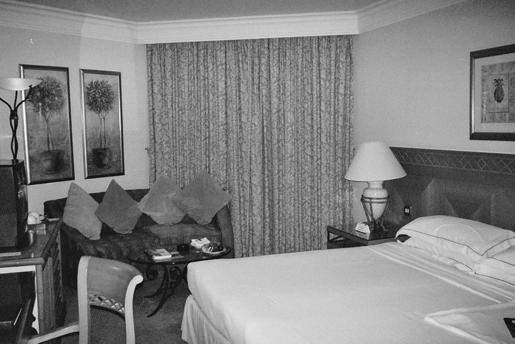 10 Question 3 Refer to Fig. 3, a photograph of a guest room in an international hotel. Fig. 3 (a) Describe, using Fig.