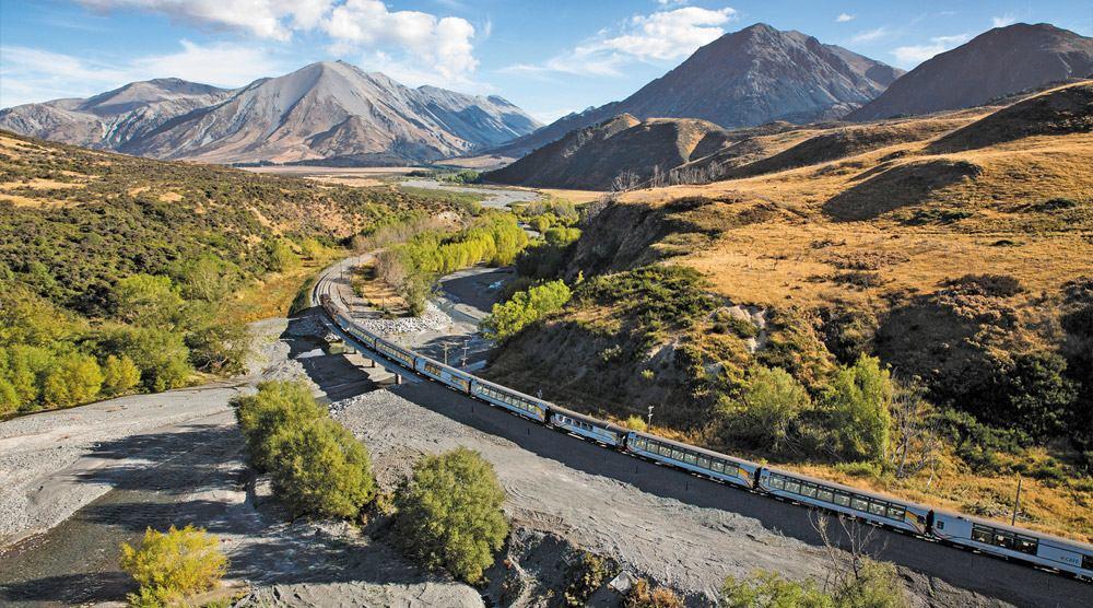 Scenic TranzAlpine Train Journey commentary that gives you detailed information on the region s history, flora and fauna as you view spectacular waterfalls, towering mountains and wildlife.