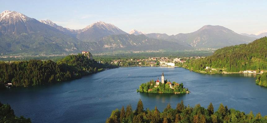 BLED - A JEWEL AMONG THE ALPS The eternal allure of Bled lies in its magical lake, a shimmering body of crystal-clear water embraced by a necklace of snow-capped Alpine peaks.