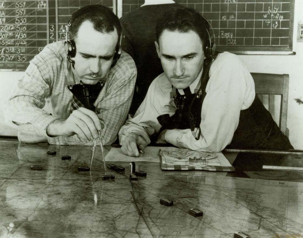 1936 Earl Ward (left) organized the