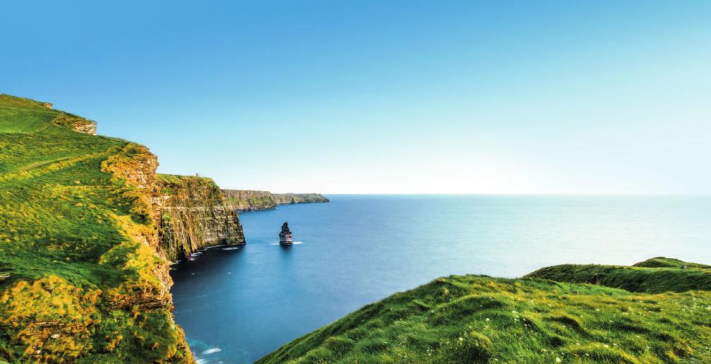 enthrall Rising high out of the Atlantic Ocean, Ireland s Cliffs of Moher are an aweinspiring sight. Located in County Clare, the cliffs stretch five miles long and 702 feet high.